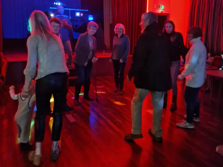 People enjoying the hall